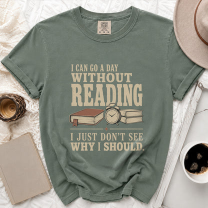 Green t-shirt with "I can go a day without reading. I just don't see why I should" text.