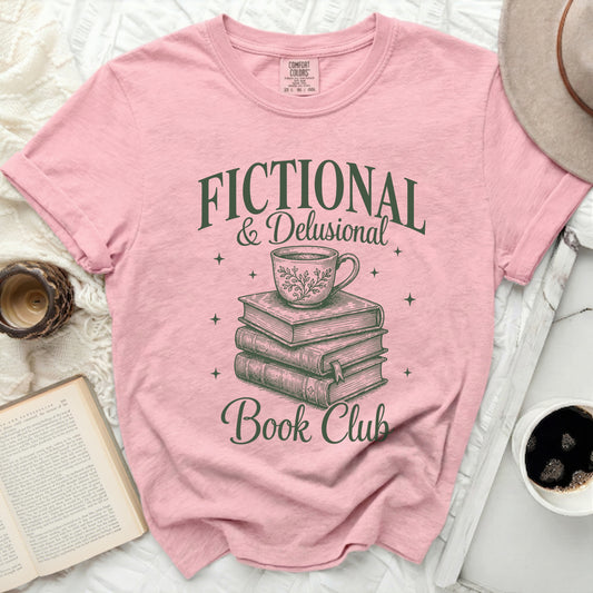 Pink t-shirt with "Fictional & Delusional Book Club" graphic.