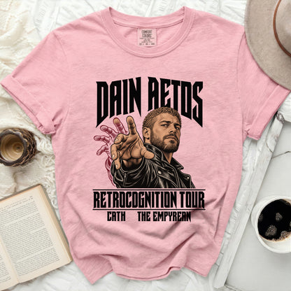 Pink t-shirt with Dain Aetos "Retrocognition Tour" graphic featuring his portrait.