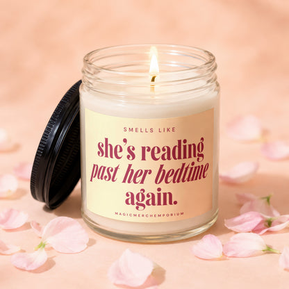 Candle with text "Smells like she's reading past her bedtime again."