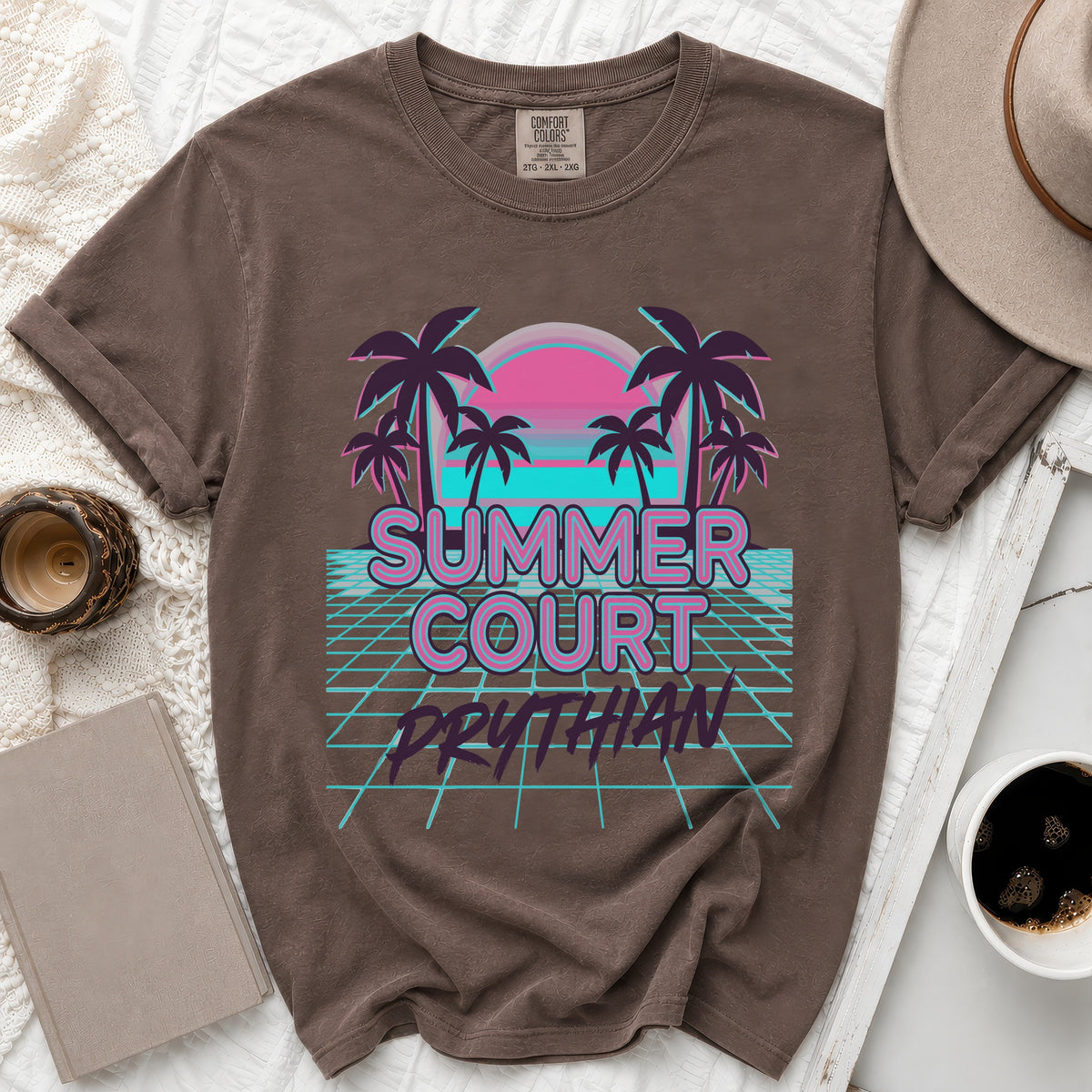 Brown Comfort Colors t-shirt with retro "Summer Court Prythian" sunset palm tree graphic.