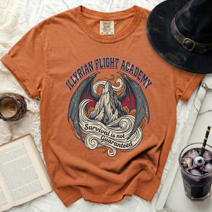 Orange t-shirt with "Illyrian Flight Academy" dragon wings and mountain graphic.