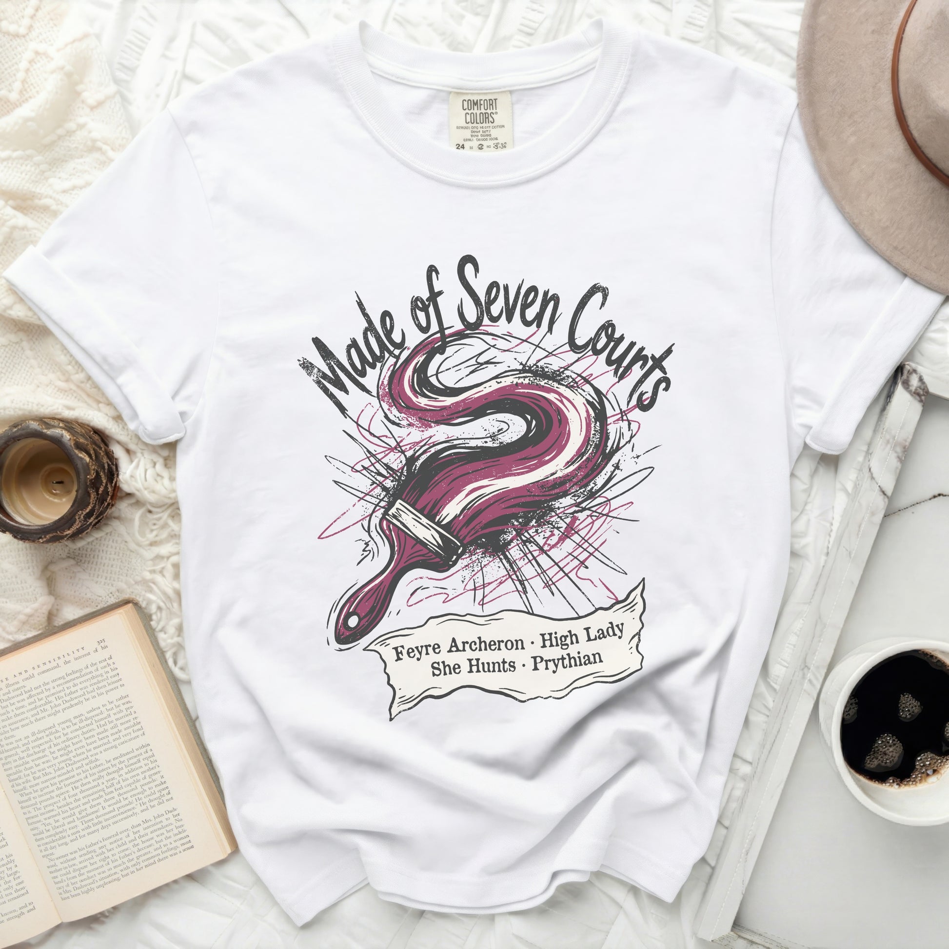 White t-shirt with "Made of Seven Courts Feyre Archeron High Lady She Hunts Prythian" design.