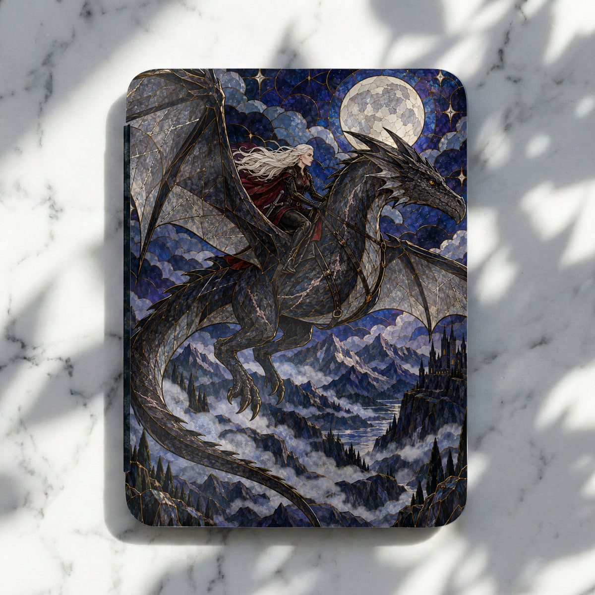 Woman with blonde hair riding a black dragon over mountains under a full moon.