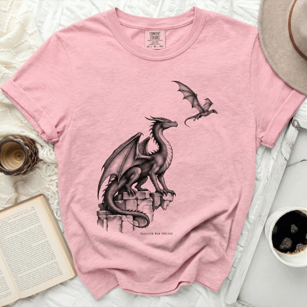 Pink t-shirt with dragon illustration and "Basgiath War College" text.