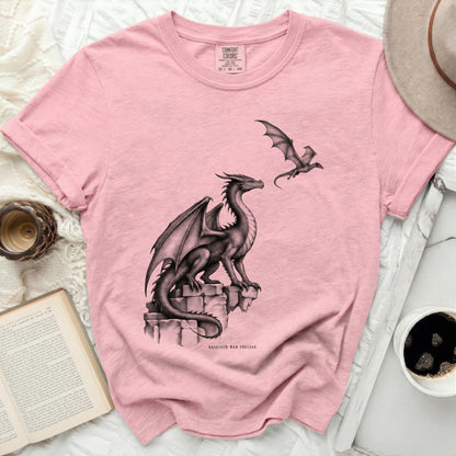 Pink t-shirt with dragon illustration and "Basgiath War College" text.