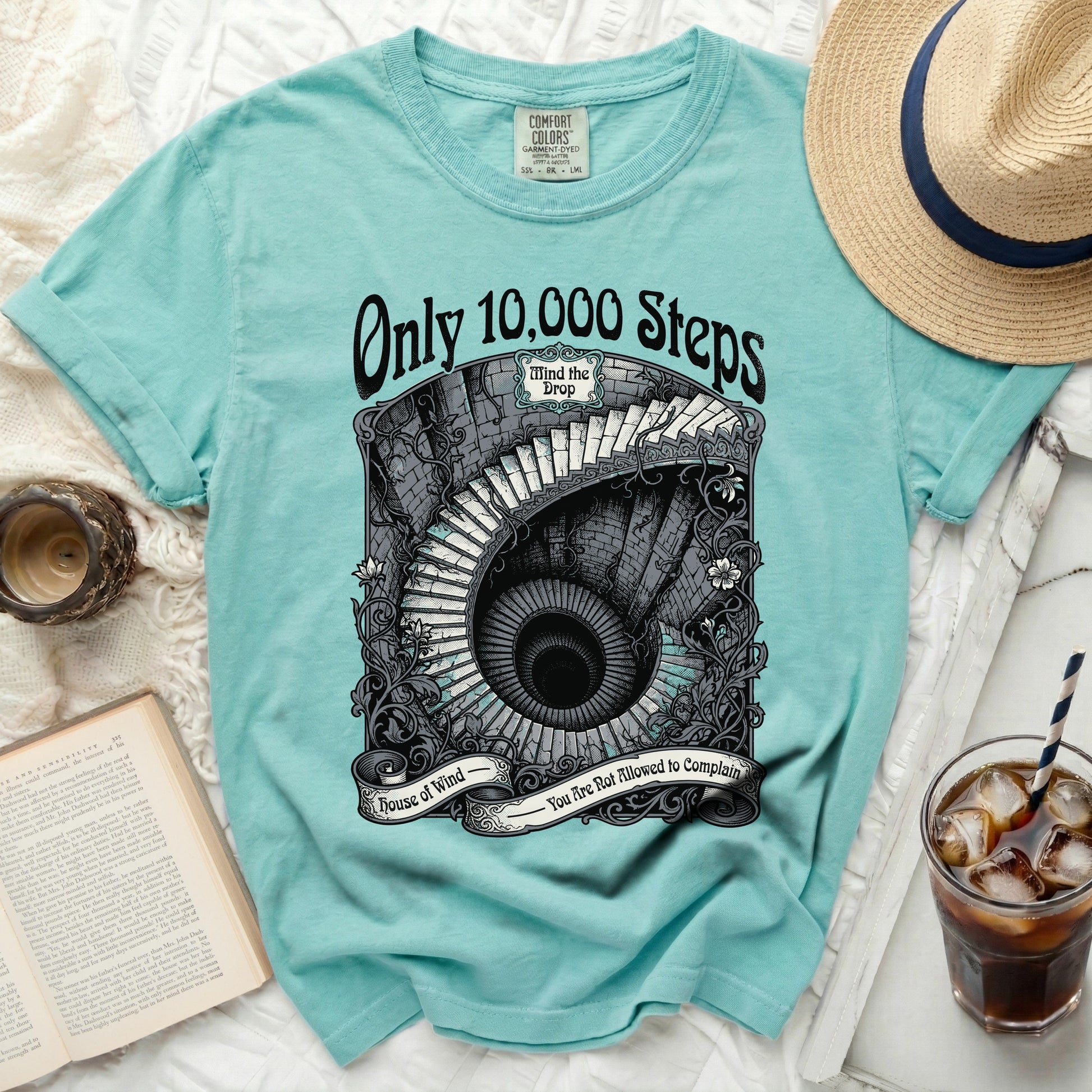 Aqua t-shirt with "Only 10,000 Steps" and a spiral staircase graphic.
