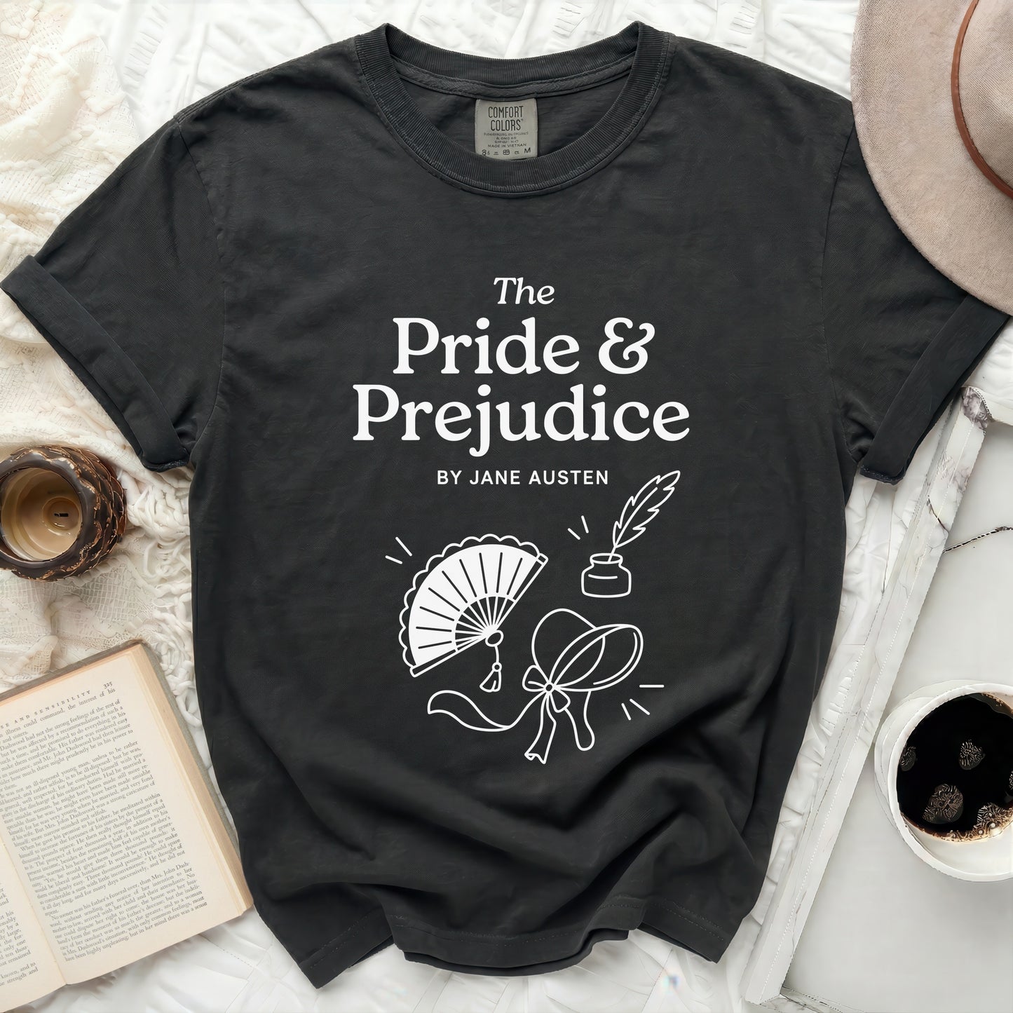 Dark grey t-shirt with "The Pride & Prejudice by Jane Austen" and line drawings.