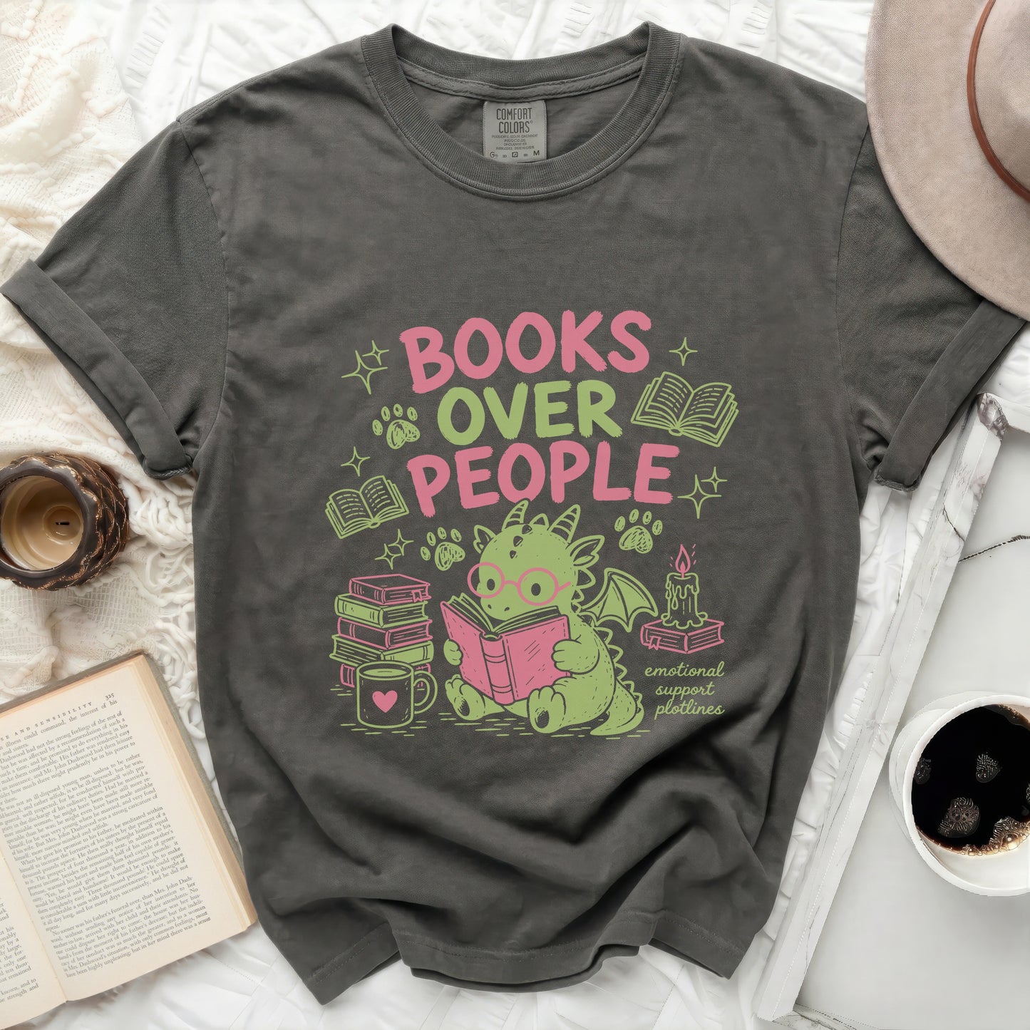 T-shirt with "Books Over People" text and cute dragon reading.