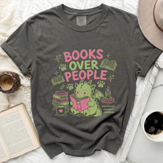 T-shirt with "Books Over People" text and cute dragon reading.