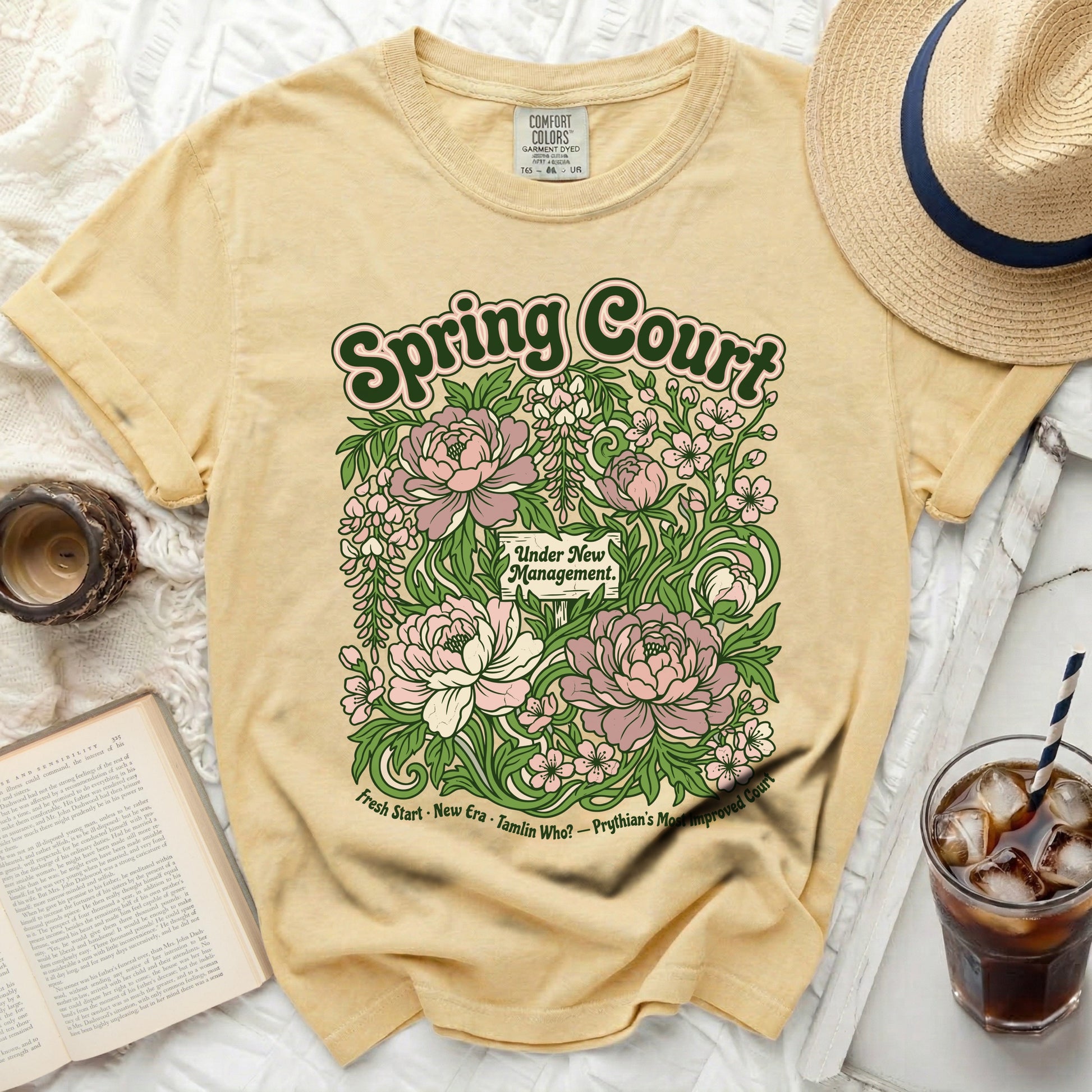 Yellow t-shirt with "Spring Court" and floral graphic with text.