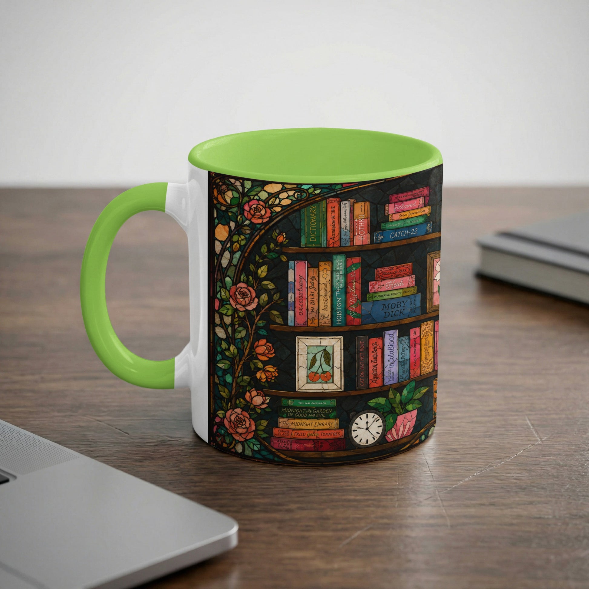 White mug with lime green handle, adorned with a bookshelf and floral stained glass design.
