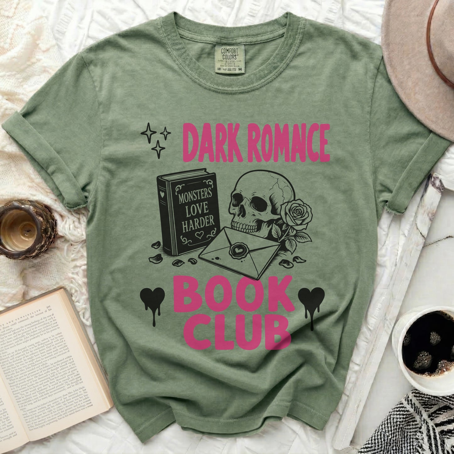 Green t-shirt with "Dark Romance Book Club" text and skull graphics.