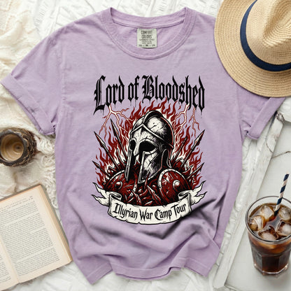 Lavender Comfort Colors t-shirt with "Lord of Bloodshed" and "Illyrian War Camp Tour" graphics.