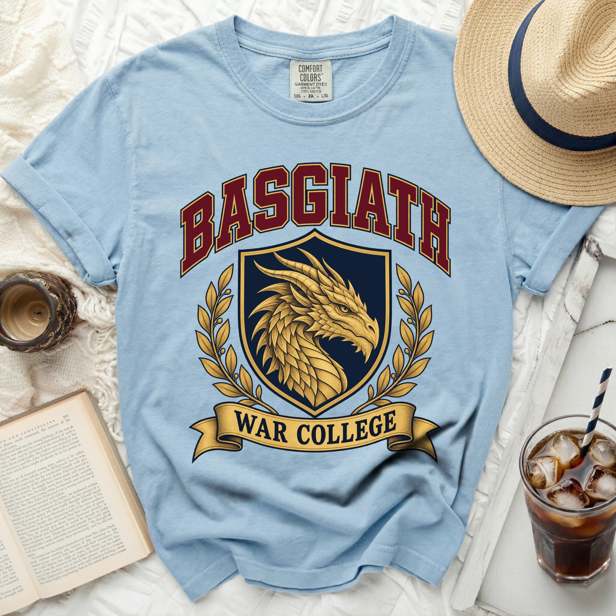 Light blue t-shirt with "Basgiath War College" and dragon crest graphic.