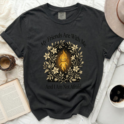 Black t-shirt with floral wreath, glowing figure, and text "My Friends Are With Me".
