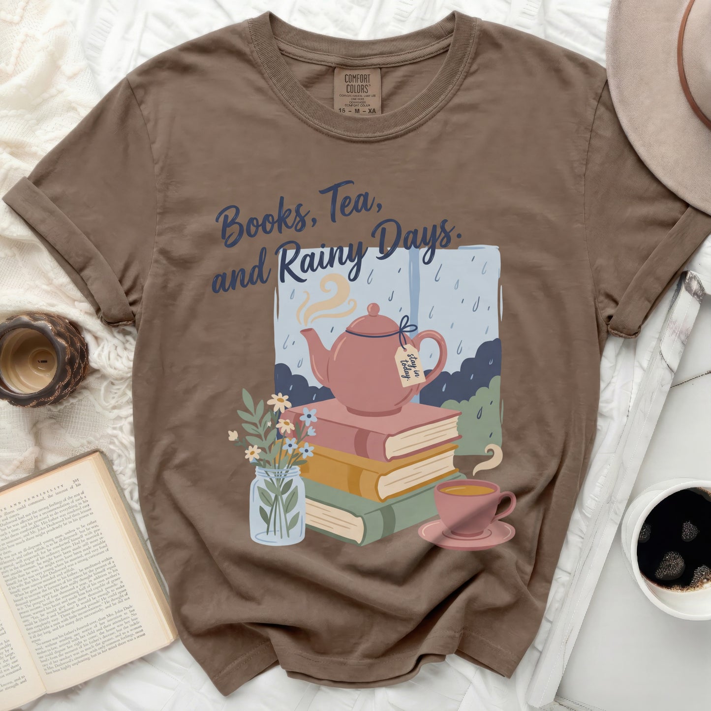 Brown t-shirt with "Books, Tea, and Rainy Days" text and a teapot illustration.