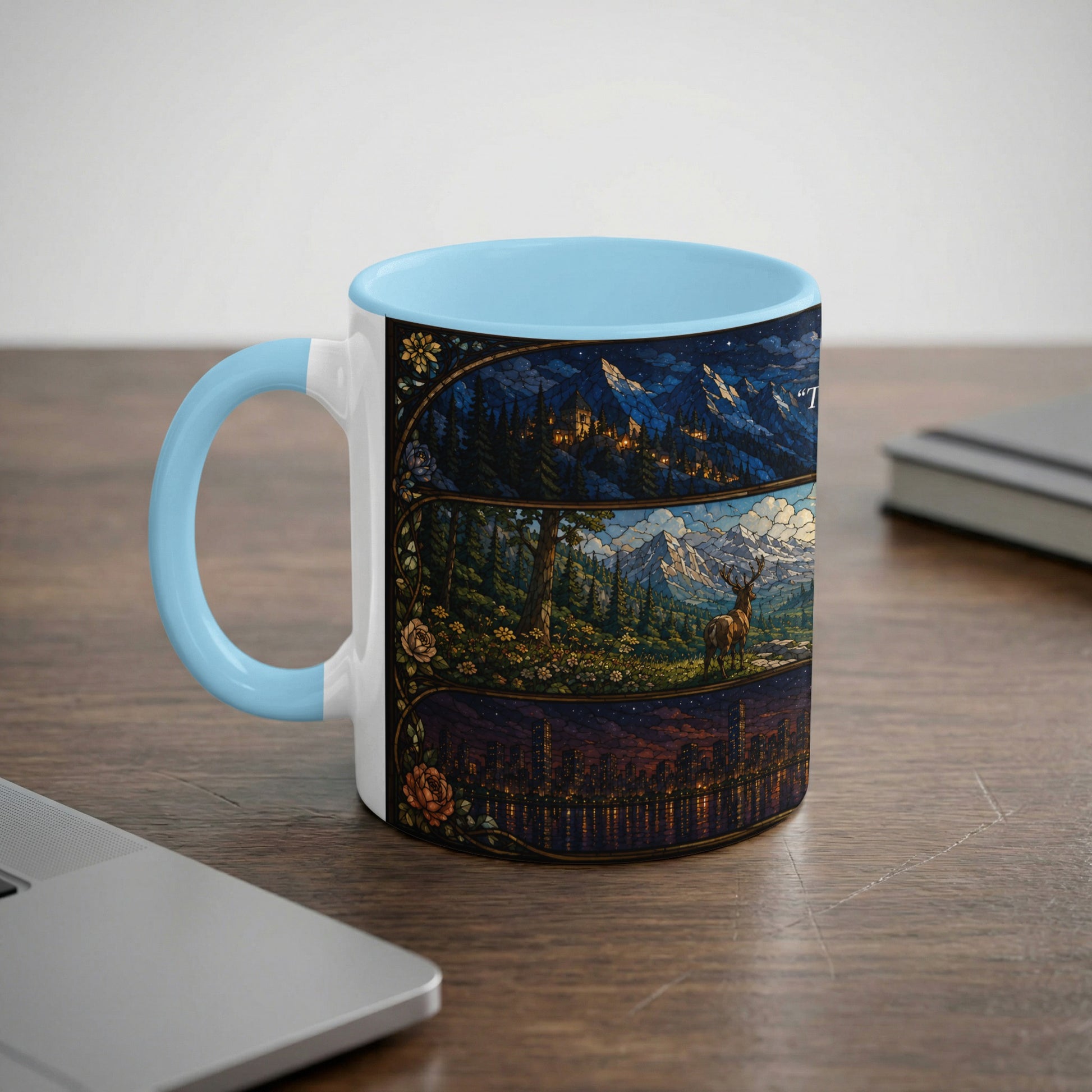 Mug with light blue handle featuring three stained-glass style panels with mountain and city scenes.