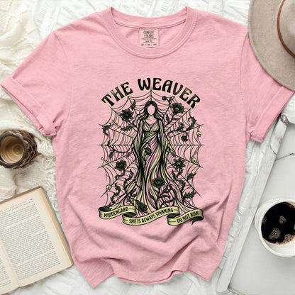 Pink t-shirt with "The Weaver" text and a skeletal woman on a spiderweb.