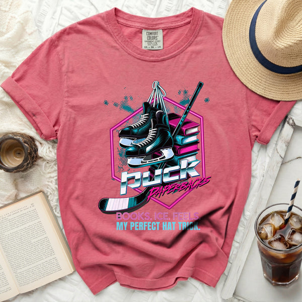 Puck Paperbacks Hockey Reader Tee in Crunchberry