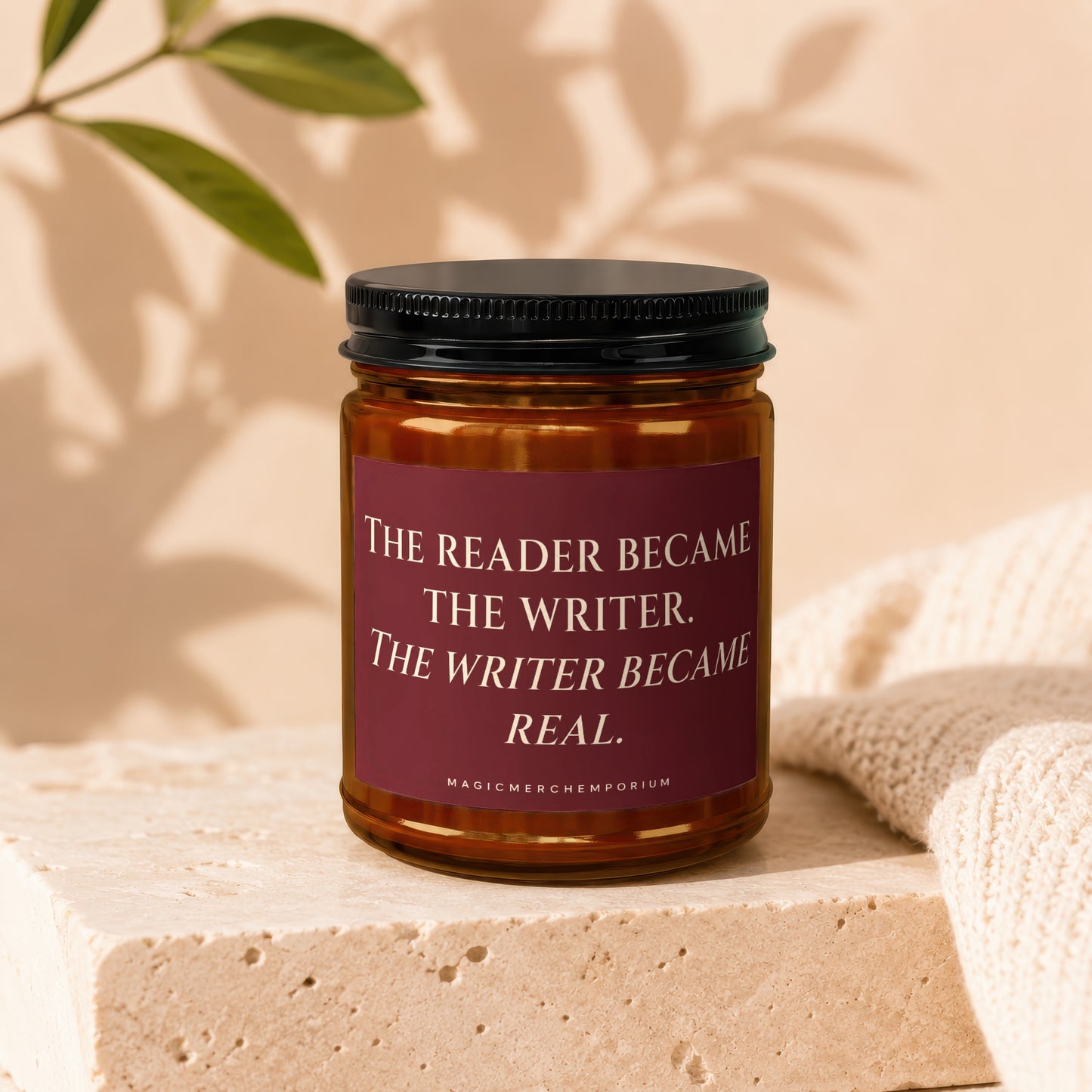 Candle with text "The reader became the writer. The writer became real."