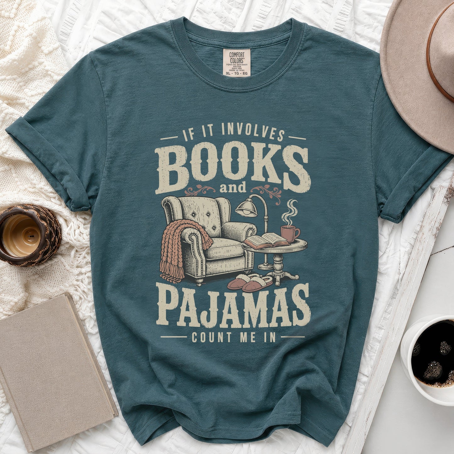 Teal t-shirt with "If it involves books and pajamas count me in" text.