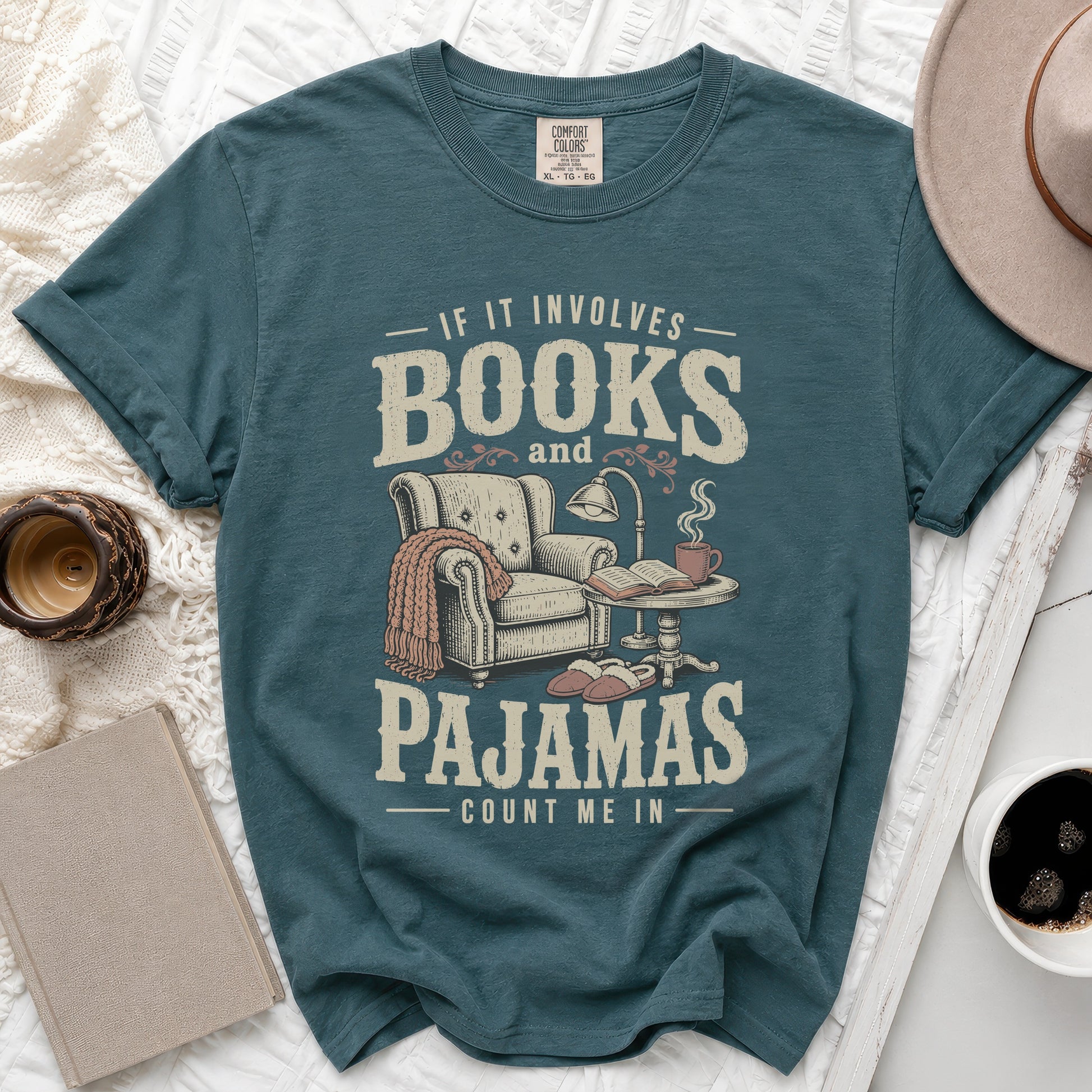 Teal t-shirt with "If it involves books and pajamas count me in" text.