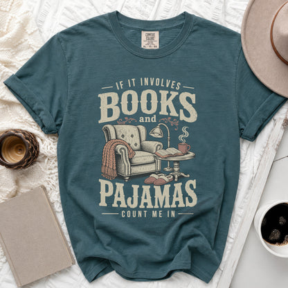 Teal t-shirt with "If it involves books and pajamas count me in" text.