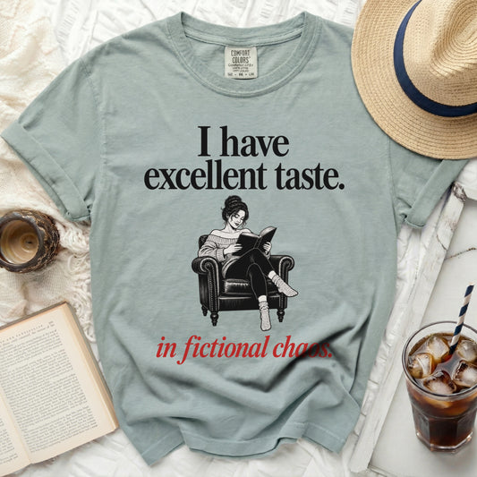 "I have excellent taste. in fictional chaos." graphic t-shirt with seated reader.