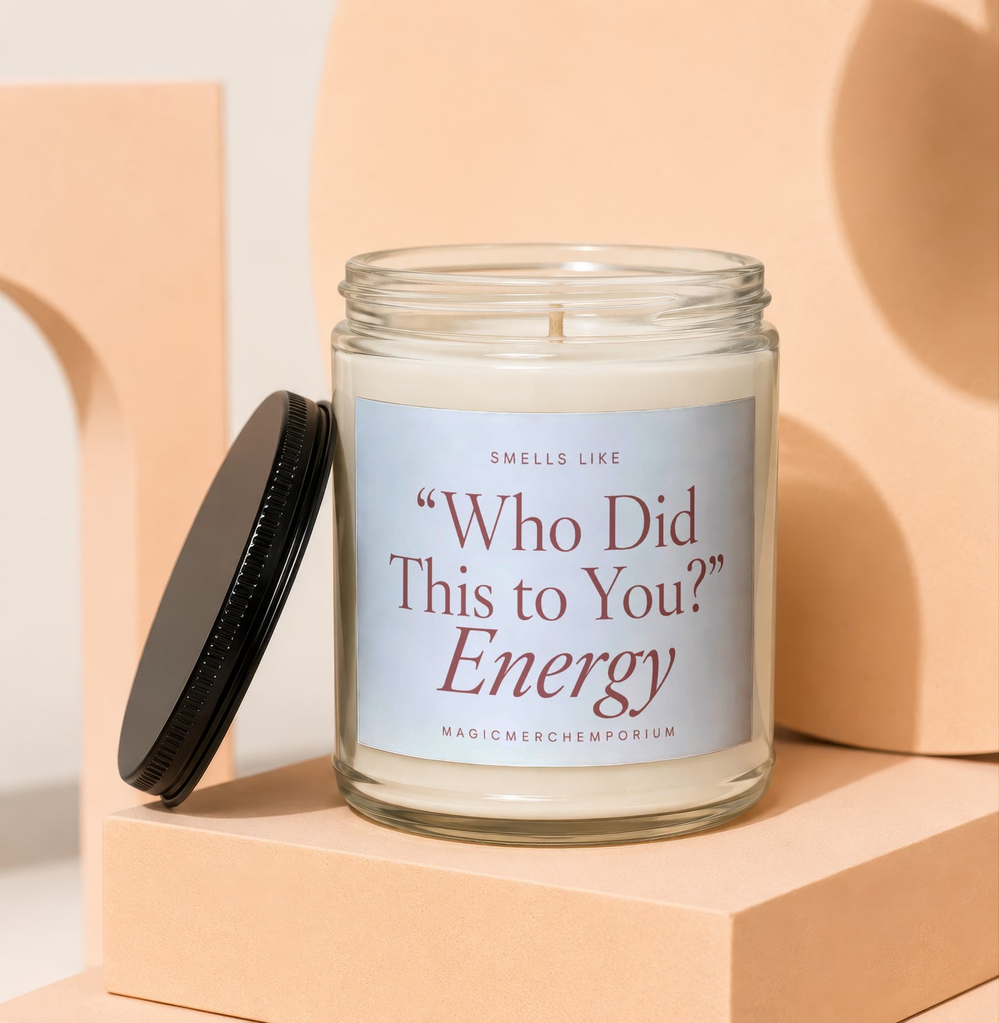 Candle labeled "Who Did This to You?" Energy.