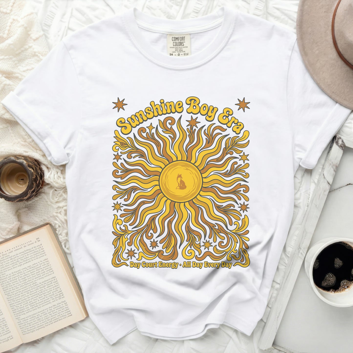 White Comfort Colors t-shirt with "Sunshine Boy Era" and sun graphic.