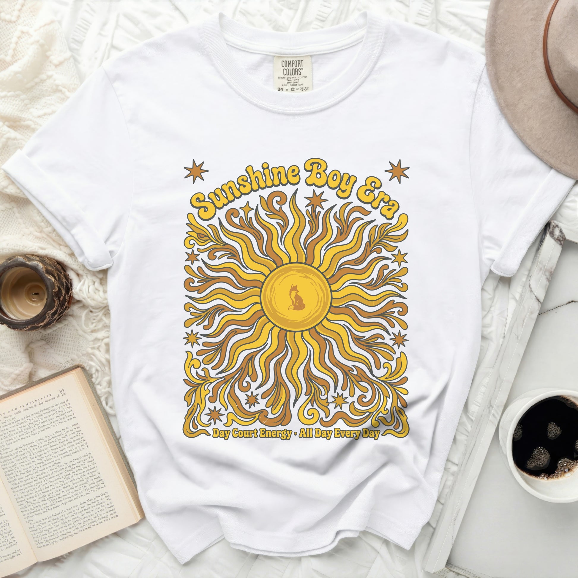 White Comfort Colors t-shirt with "Sunshine Boy Era" and sun graphic.