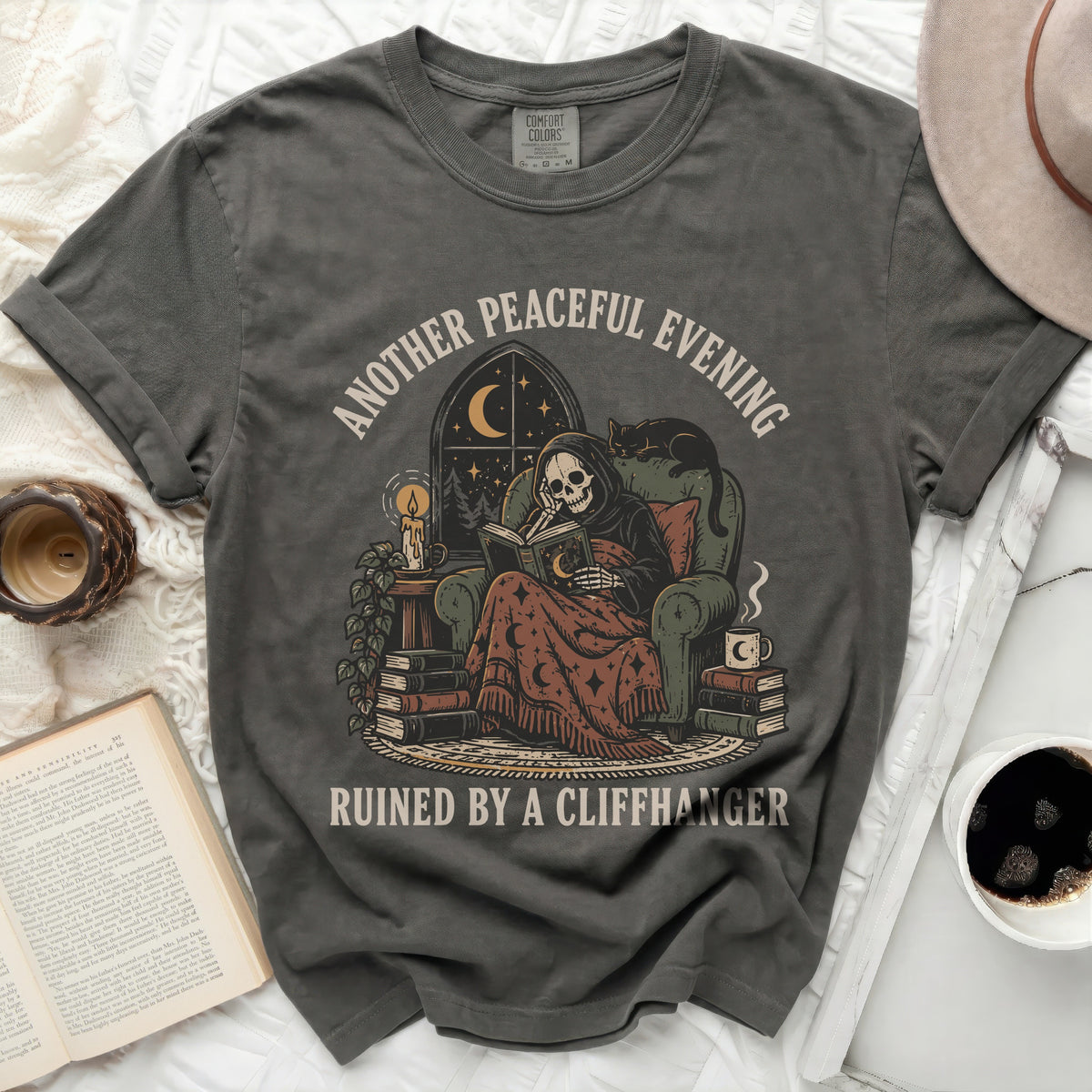 Skeleton reading a book with text "Another peaceful evening ruined by a cliffhanger."