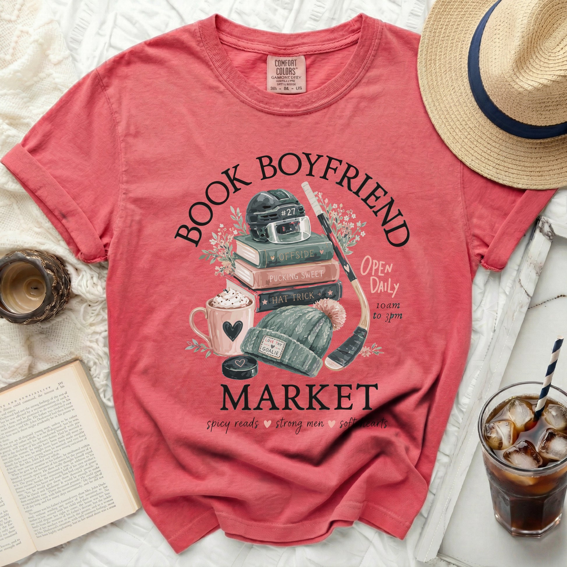 Coral t-shirt with "Book Boyfriend" hockey theme and text "Market".