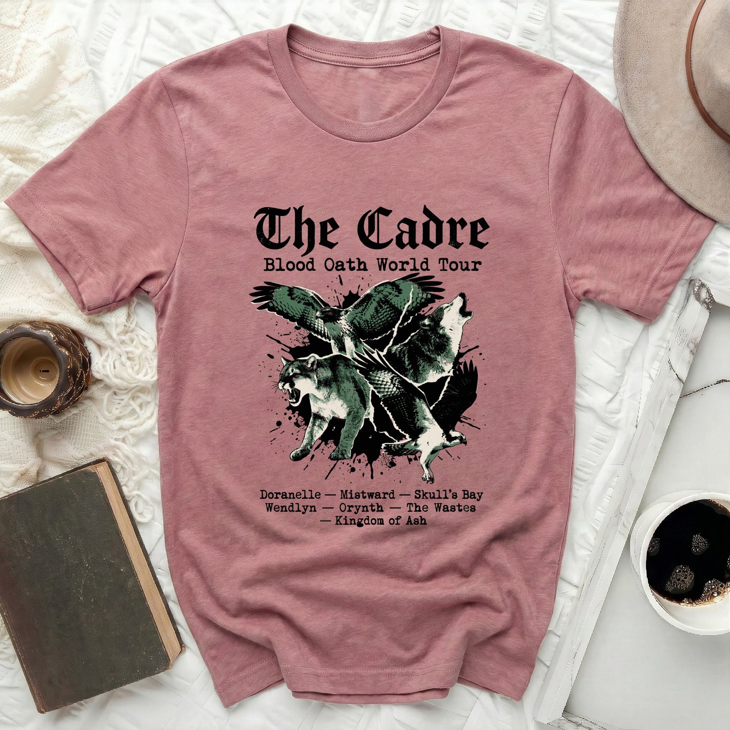 Rose t-shirt with "The Cadre Blood Oath World Tour" and creature graphics.