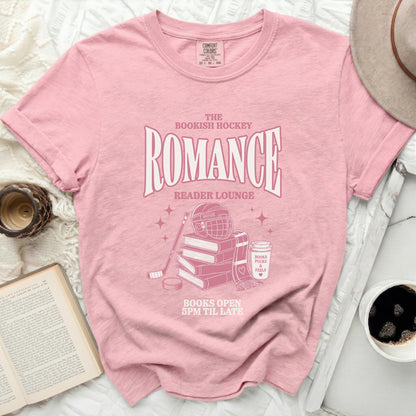 Pink t-shirt with "The Bookish Hockey Romance Reader Lounge" text.