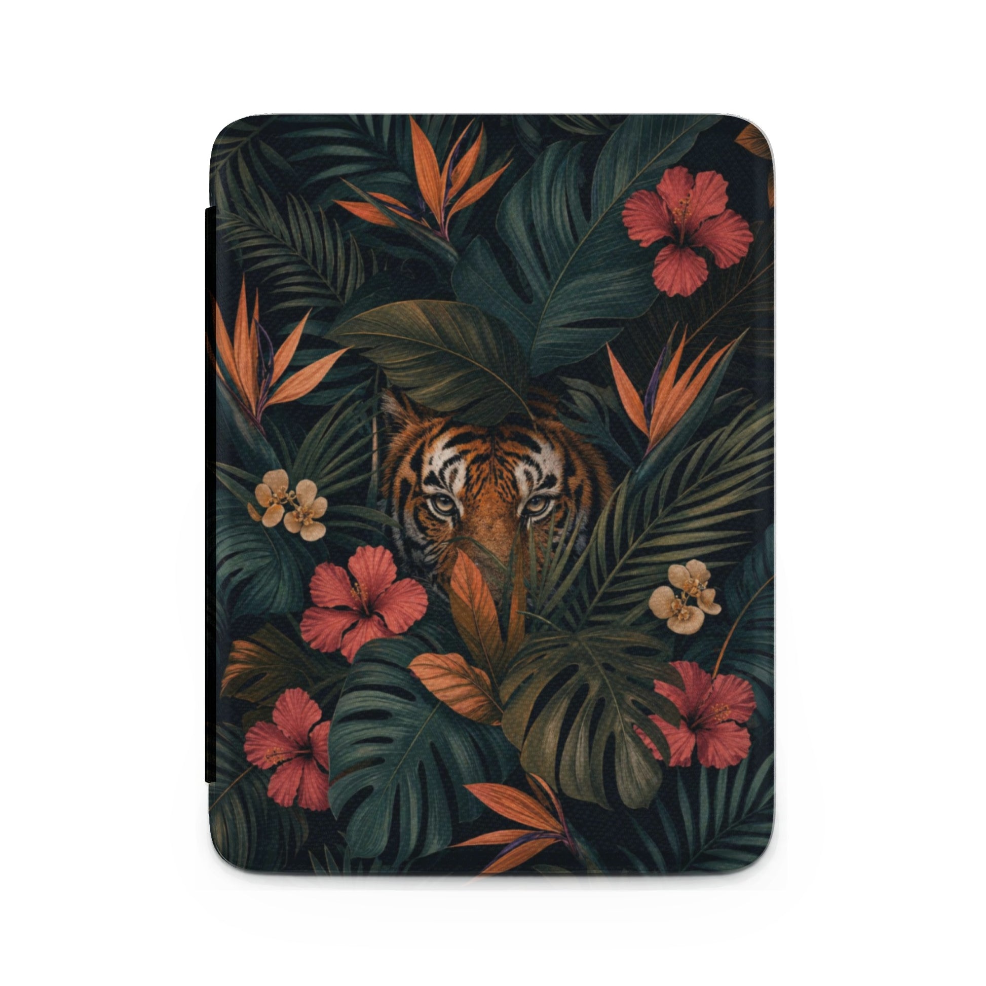 Tiger peeking through lush dark green tropical leaves with red and orange flowers.