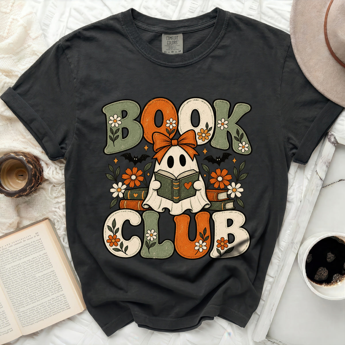 Dark t-shirt with "BOOK CLUB" graphic featuring a ghost reading a book.