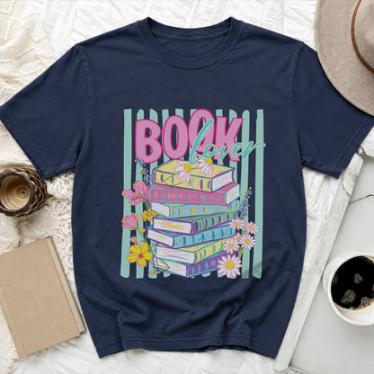 Navy t-shirt featuring stacked books, flowers, and the text "Book lover".