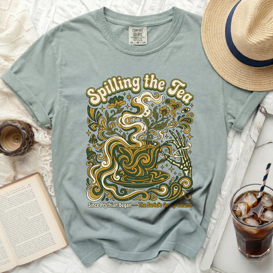 Comfort Colors sage green t-shirt with "Spilling the Tea" graphic.