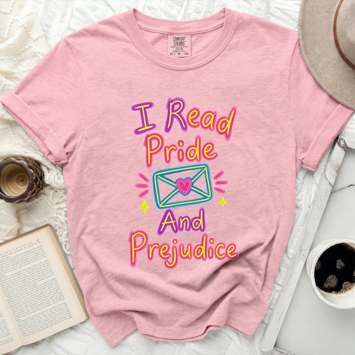 Pink Comfort Colors t-shirt with "I Read Pride And Prejudice" text
