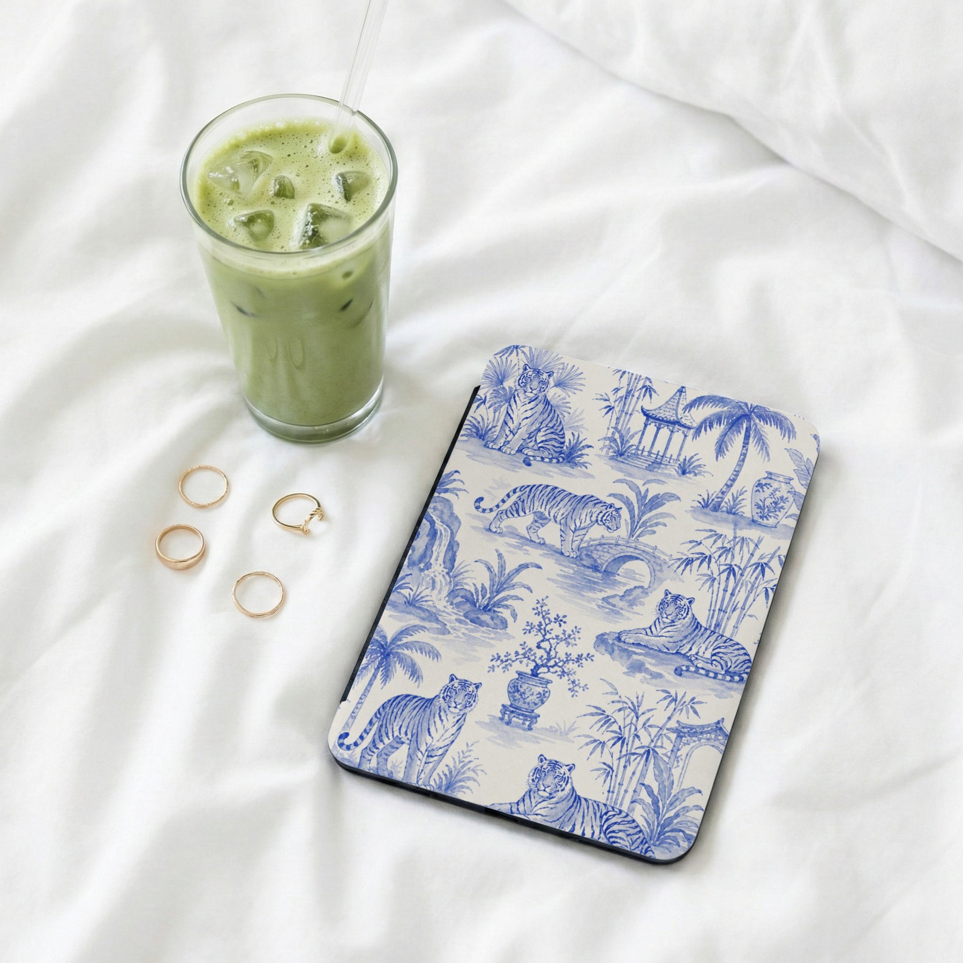Mousepad with blue and white tiger and pagoda toile pattern.