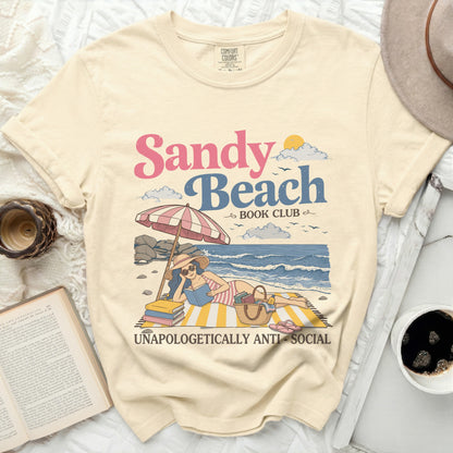 Sandy Beach Book Club graphic on a light yellow t-shirt.