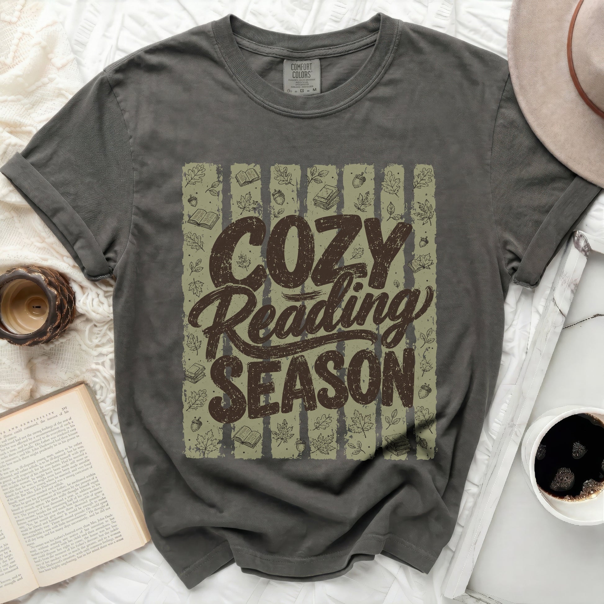 Comfort Colors t-shirt with "Cozy Reading Season" text and fall motifs.