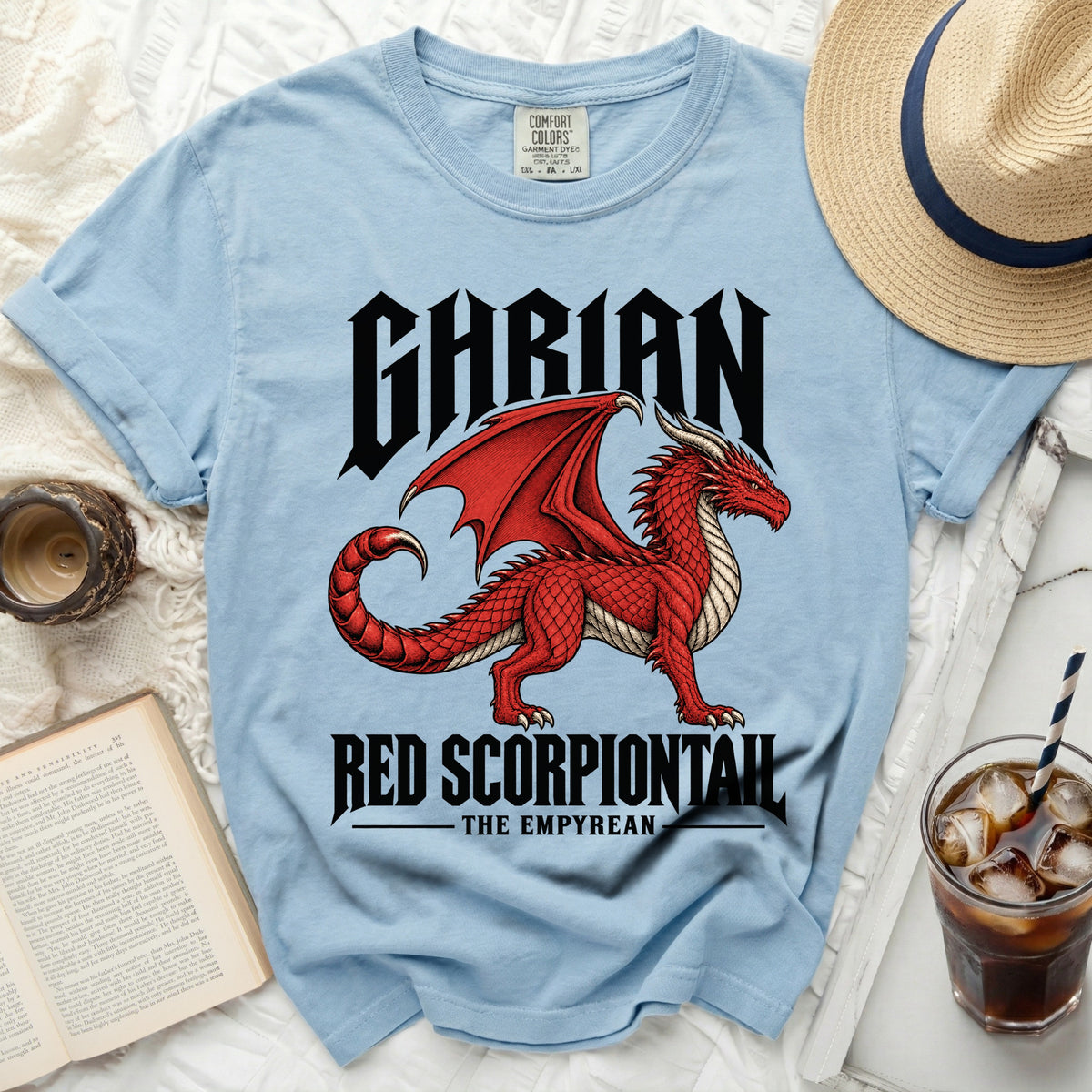 Light blue t-shirt with red dragon graphic and text "GHARIAN RED SCORPIONTAIL THE EMPYREAN".