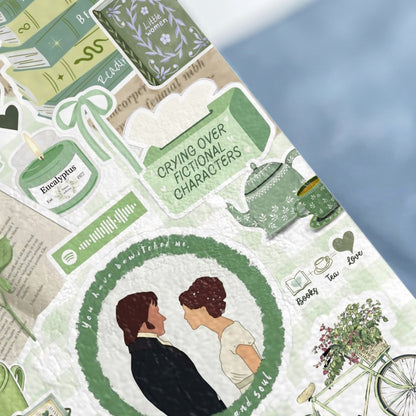 Book-themed stickers with a couple, candle, tea set, and bicycle.