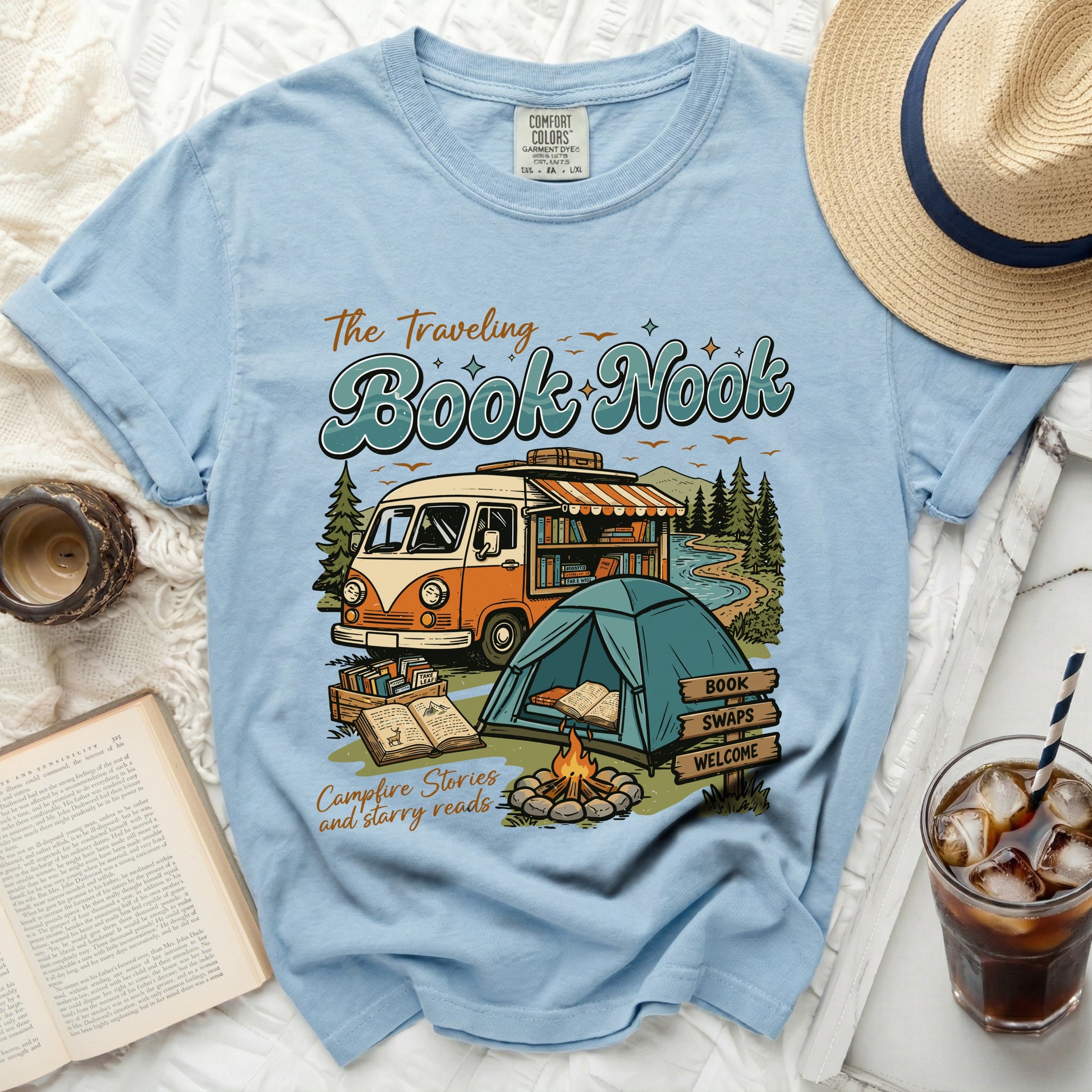 "The Traveling Book Nook" graphic with van, tent, and campfire.