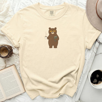 T-shirt with a grumpy bear holding a coffee mug and a book.