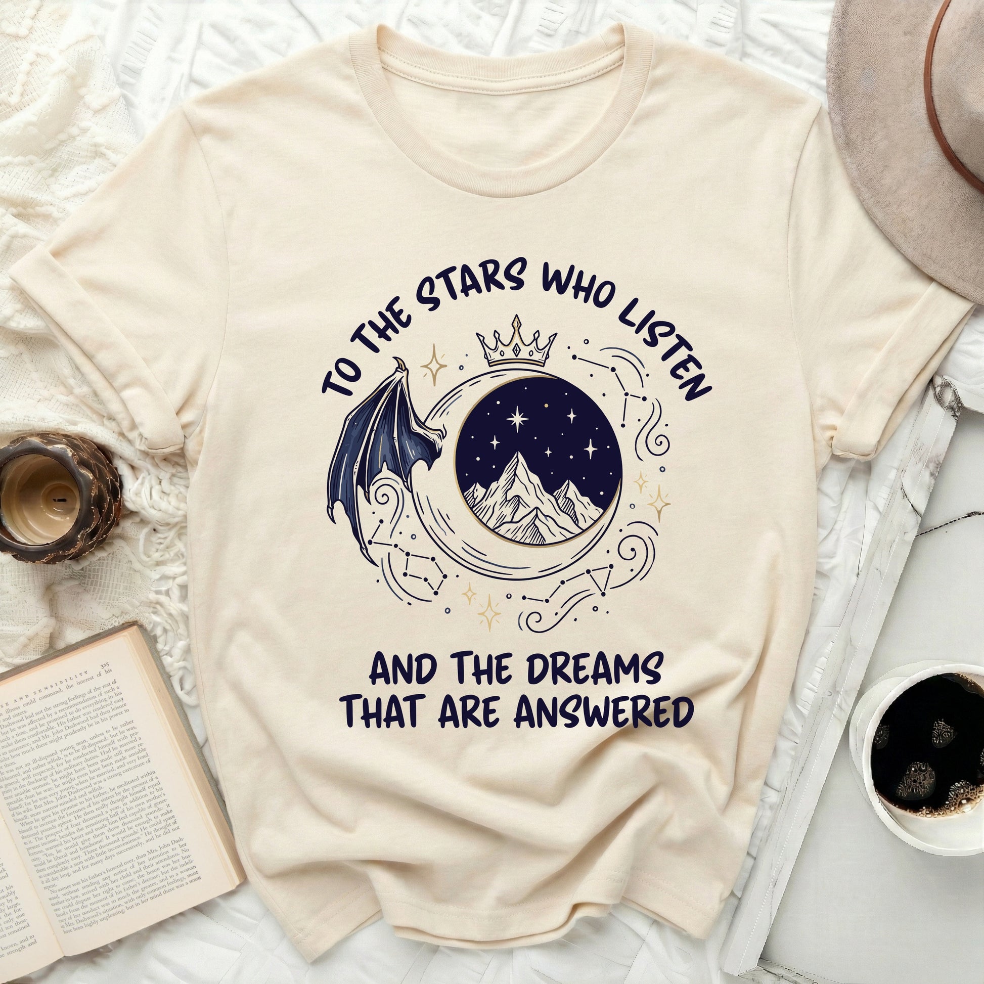 Stars Who Listen Dreams Are Answered product type
Stars Who Listen
Dreams Answered
Celestial Design
Fantasy Art
Moon Mountains
Dragon Wing
Crown Graphic
Night Sky
Constellations
Bookish Quote
Literary Fan
SJM Inspired
ACOTAR Fandom
Magical Theme
Mythical Beast
Inspirational Art
Fae Magic
Starry Aesthetic
Unique Graphic
Creative Design