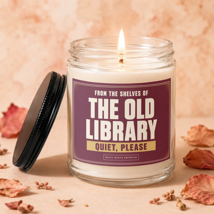 Candle in glass jar with label reading "The Old Library Quiet, Please".